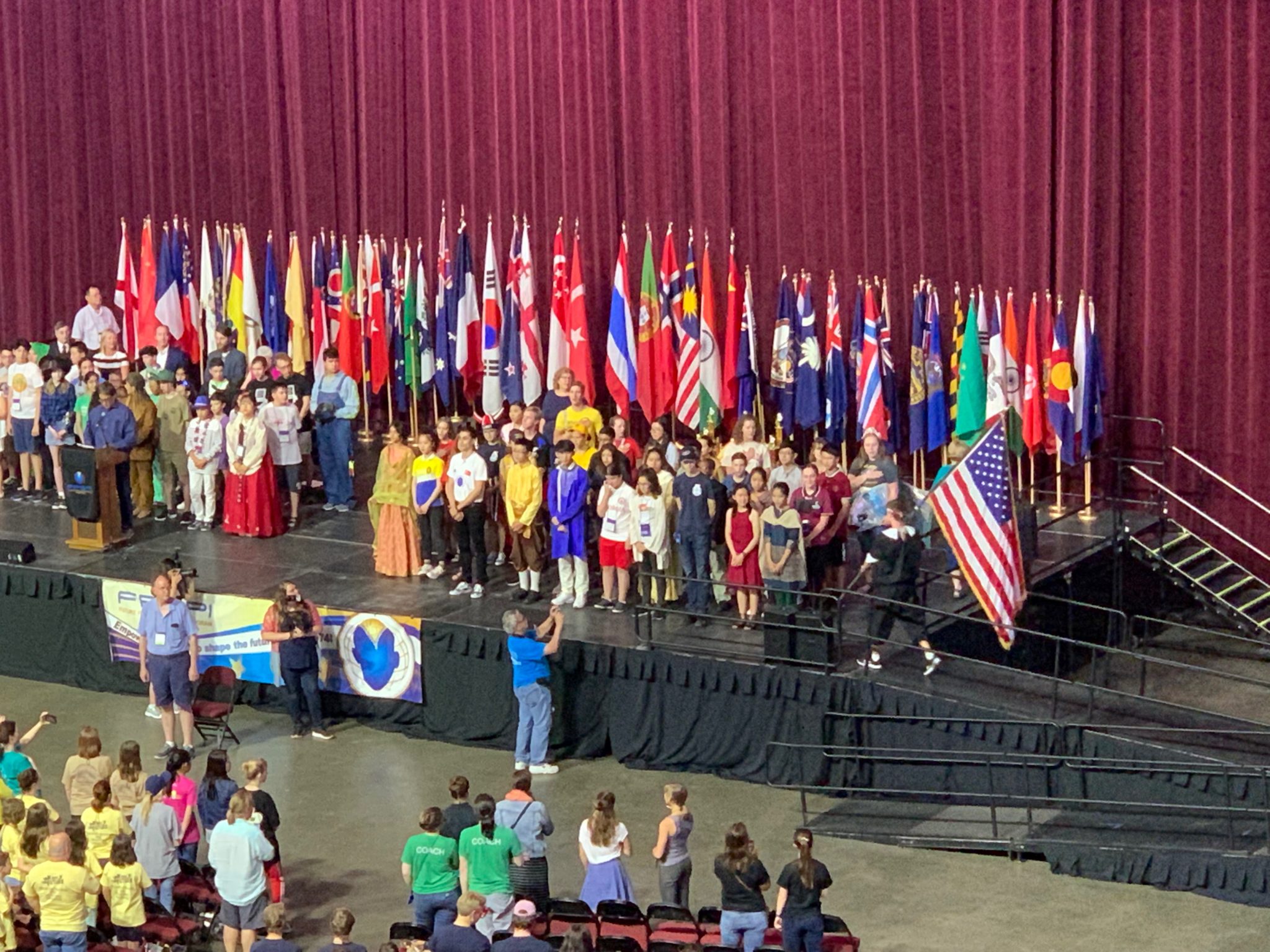 Celebration of flags on the stage.