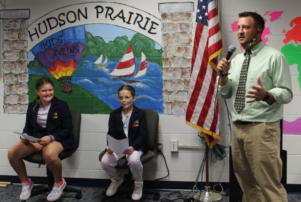 Principal Behnke sharing some updates on the Hudson Prairie Kids News program!