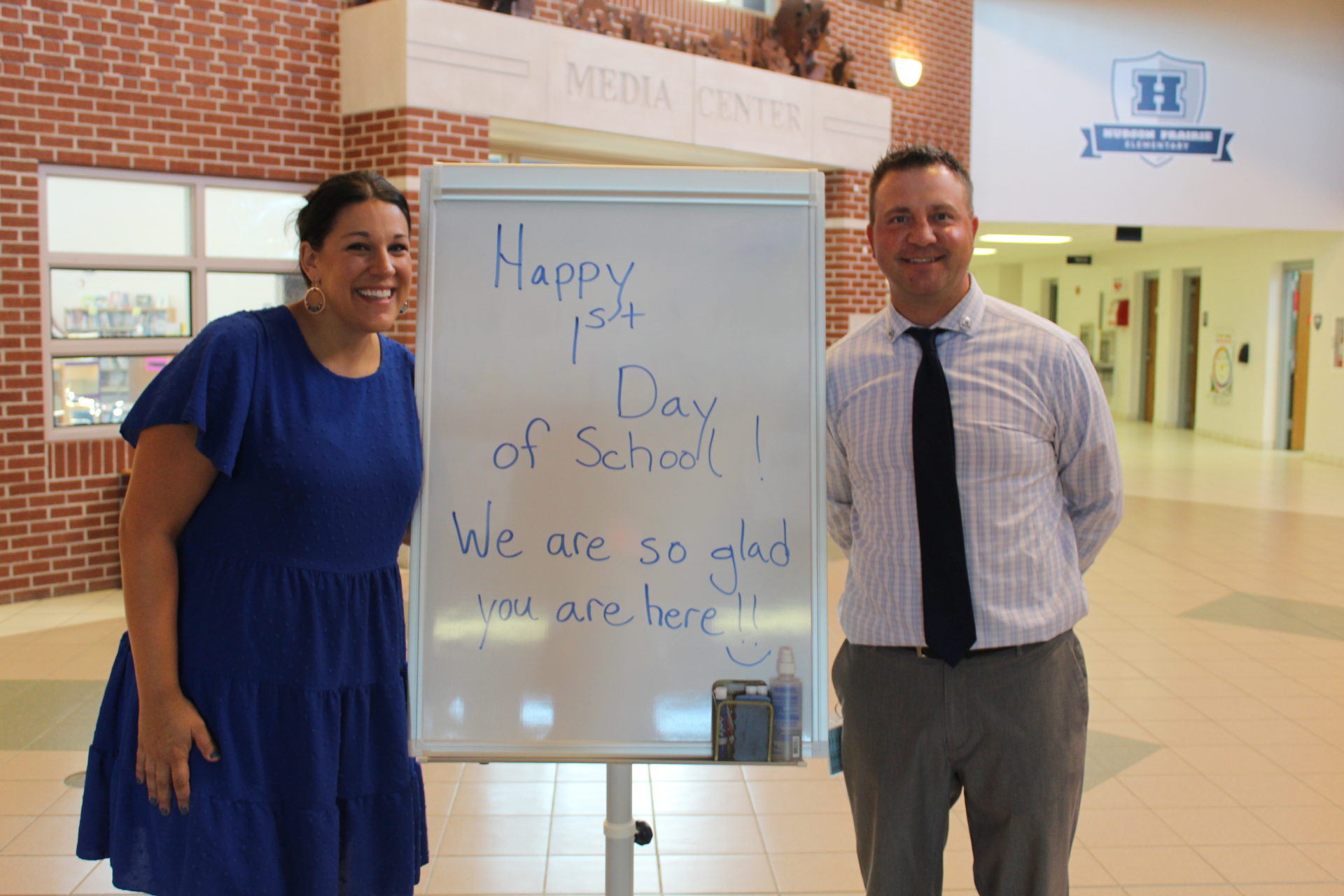 Mr. Bahnke and school counselor Aria Krieser welcome students on the first day.