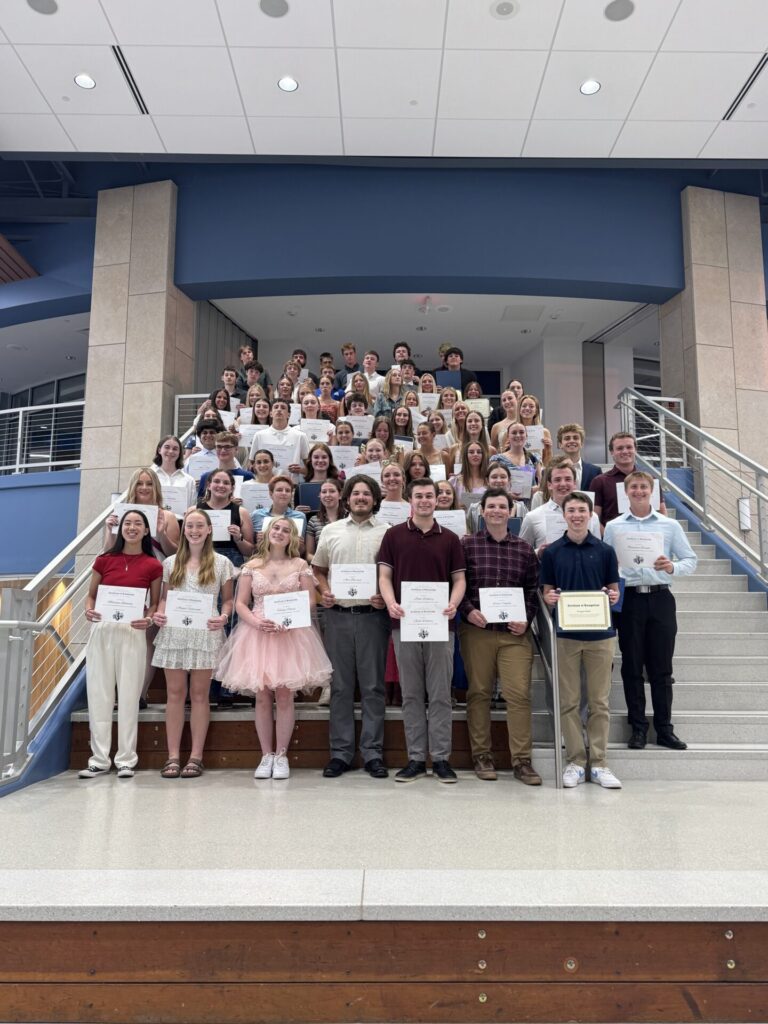 Scholarship recipients gathered on the forum stairs at the High School.